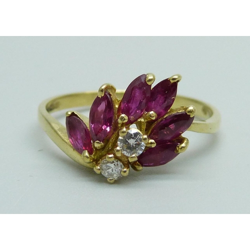 983 - An 18ct gold ruby and diamond ring, 3.1g, O