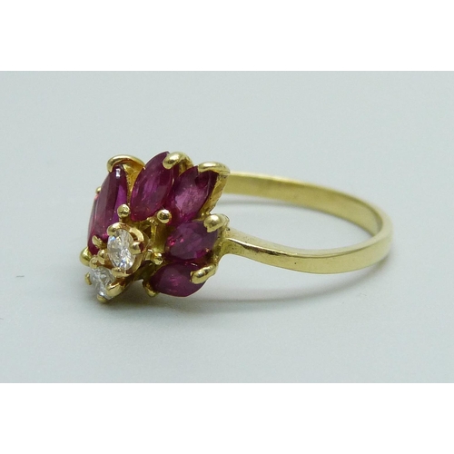 983 - An 18ct gold ruby and diamond ring, 3.1g, O