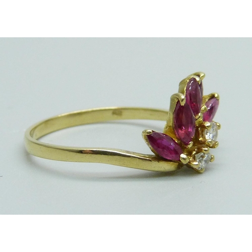 983 - An 18ct gold ruby and diamond ring, 3.1g, O