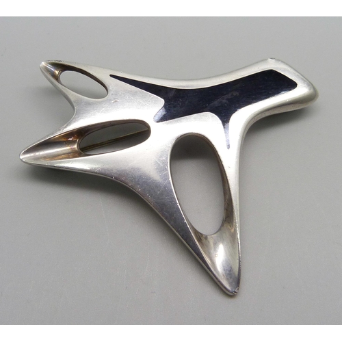 993 - A silver Georg Jenson 323 black enamelled brooch designed by Henning Koppel