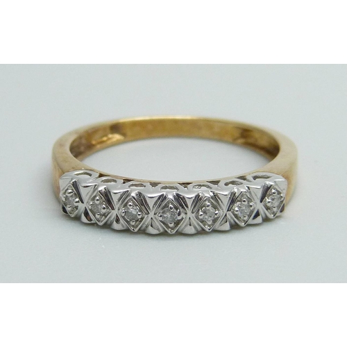 997 - A 9ct gold seven stone diamond ring, 2g, P