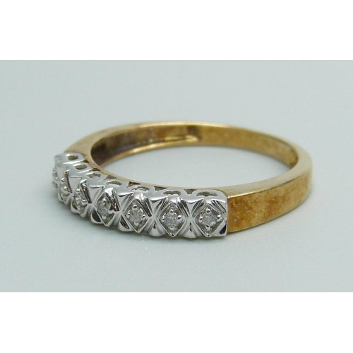 997 - A 9ct gold seven stone diamond ring, 2g, P