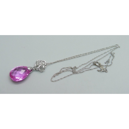 998 - A 10kt white gold, diamond and pink faceted stone pendant on a 10kt white gold chain, total weight 3... 