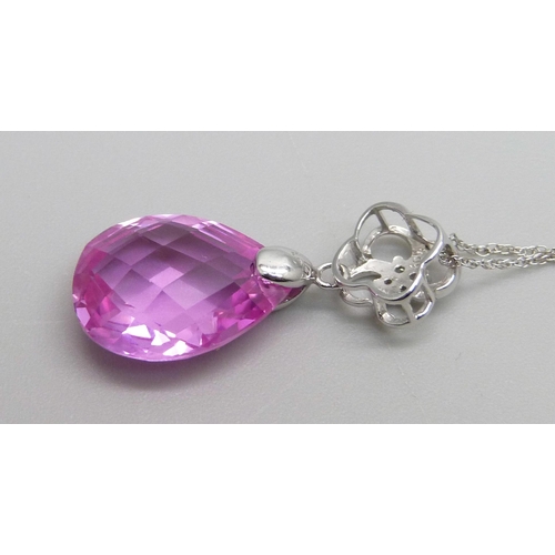 998 - A 10kt white gold, diamond and pink faceted stone pendant on a 10kt white gold chain, total weight 3... 