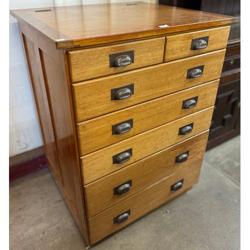 262 - A pine and beech architects style chest of drawers