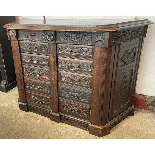 110 - A 17th Century James II carved oak credence cupboard