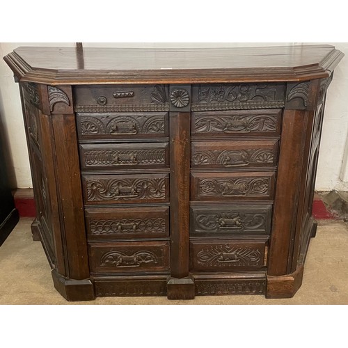 110 - A 17th Century James II carved oak credence cupboard