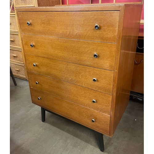 86 - A teak chest of drawers