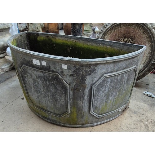 292 - An 18th Century style lead demi lune garden planter