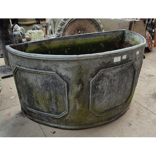 292 - An 18th Century style lead demi lune garden planter