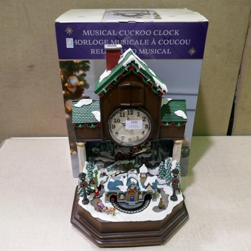 3302 - Festive Cuckoo Clock (323-163) *This lot is subject to VAT