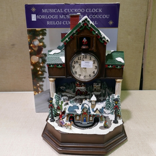 3302 - Festive Cuckoo Clock (323-163) *This lot is subject to VAT