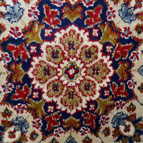 1319 - A Red ground full pile cashmere floral design rug (230x160cm)