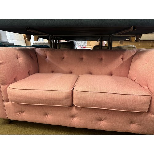 1366 - Pink upholstered Chesterfield three seater sofa RRP £1399