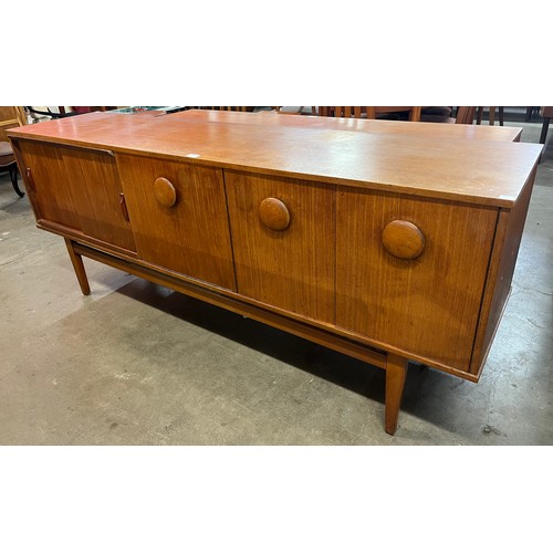 61 - A teak sideboard