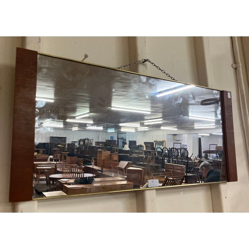 70 - A teak framed mirror