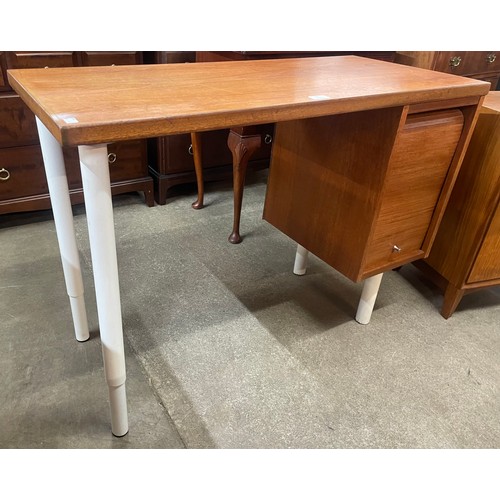 85 - A teak and white metal desk