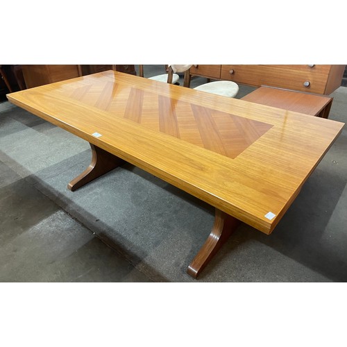 88 - A teak metamorphic coffee/dining table