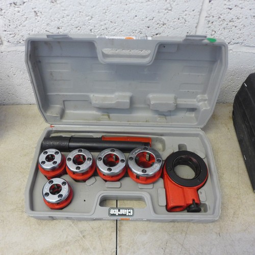 2339 - A Clarke Pump 1 1/2” 250w puddle pump, a Clarke 6pc die pipe threading kit and a Clarke CP185 angle ... 