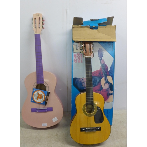 2093B - Two children's acoustic guitars - one boxed Horner folk guitar and one pink Ready Ace guitar with sp... 