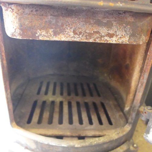 2202 - Two Clarke cast metal solid fuel burning stoves (8037/8038) * this lot is sold as scrap + VAT*