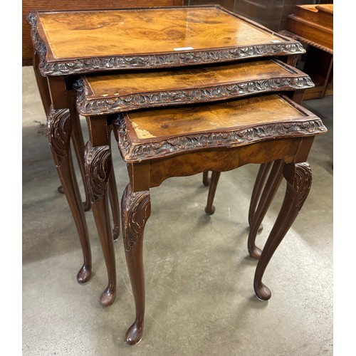 241 - A Queen Anne style burr walnut nest of tables