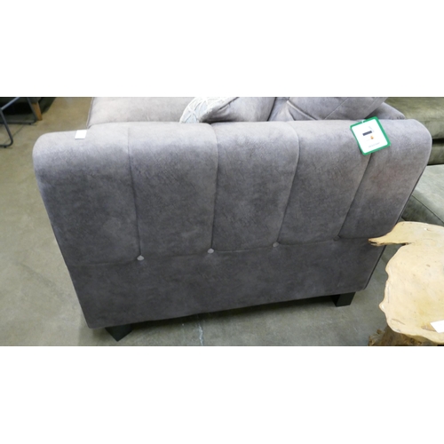 1321 - A chocolate studded back 2 seater sofa  * This lot is subject to VAT