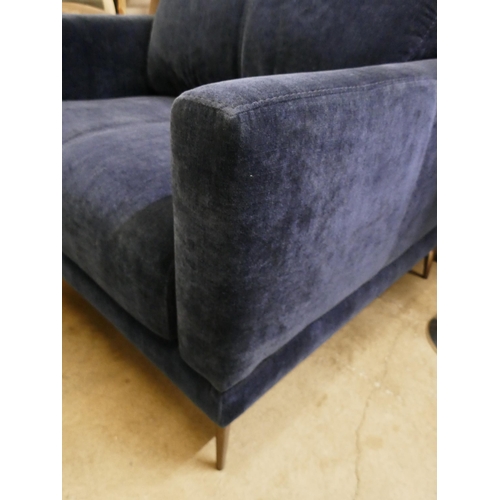 1340 - A deep blue velvet oversized  armchair  * This lot is subject to VAT
