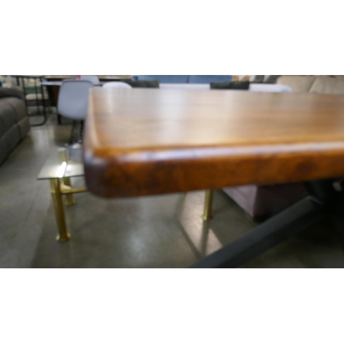 1361 - A solid hardwood and steel dining table  *This lot is subject to VAT