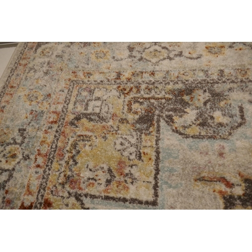 1364 - A Cream ground full pile vintage look rug with hints of duck egg blue (230x160cm)