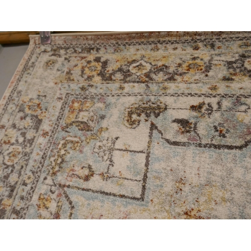 1372 - A multi-coloured ground vintage look carpet, 200 x 300cm