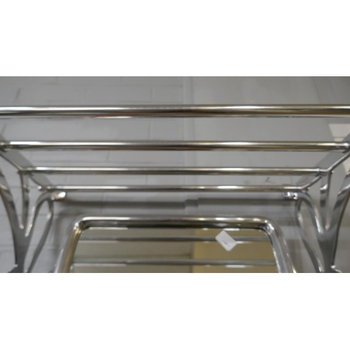 1403 - A chrome luggage and coat rack with mirror