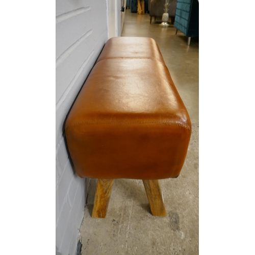 1404 - A tan leather vaulting horse style stool