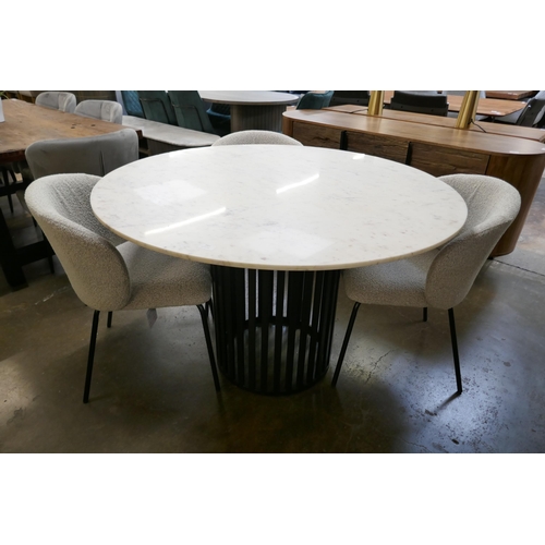 1411 - A marble and black steel circular dining table and four boucle chairs  *This lot is subject to VAT