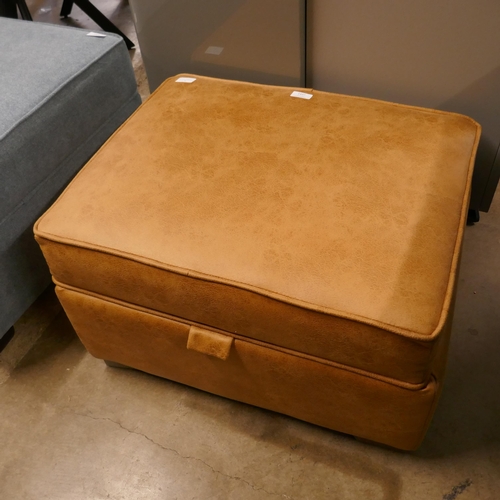1437 - A leather effect storage footstool