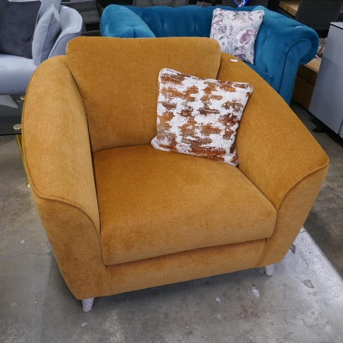 1446 - A tangerine upholstered armchair on grey washed hardwood legs