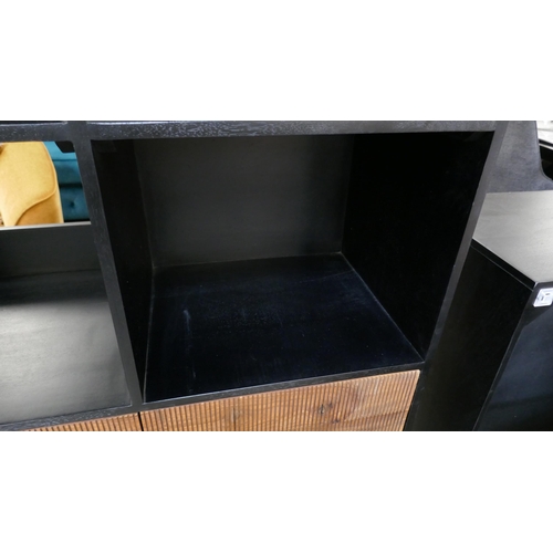 1447 - A black and grooved hardwood shelving unit  *This lot is subject to VAT