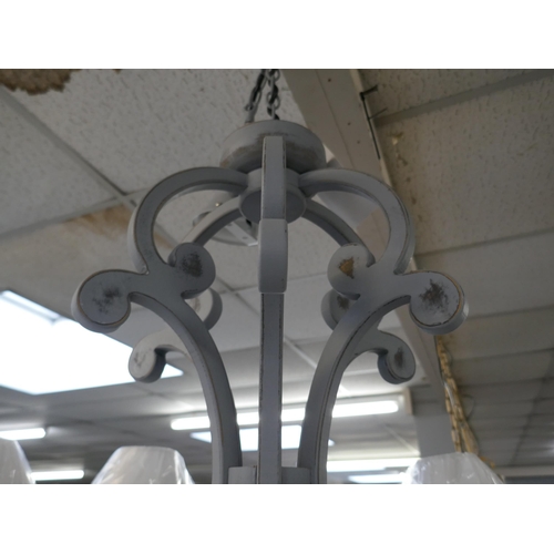 1486 - A Coachhouse six arm grey chandelier