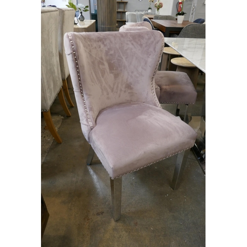 1475 - A marble effect and chrome dining table with four blush velvet buttoned chairs  *This lot is subject... 