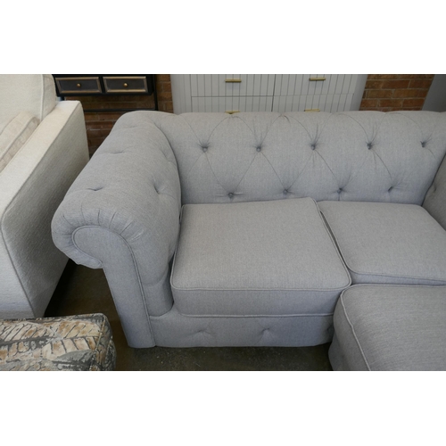 1493 - A grey upholstered Chesterfield corner sofa RRP £1899