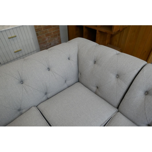 1493 - A grey upholstered Chesterfield corner sofa RRP £1899