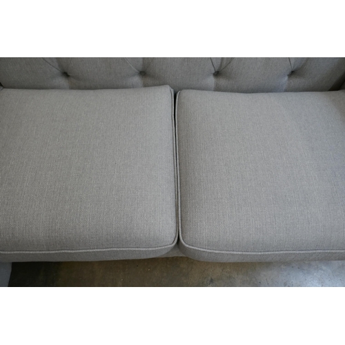 1493 - A grey upholstered Chesterfield corner sofa RRP £1899