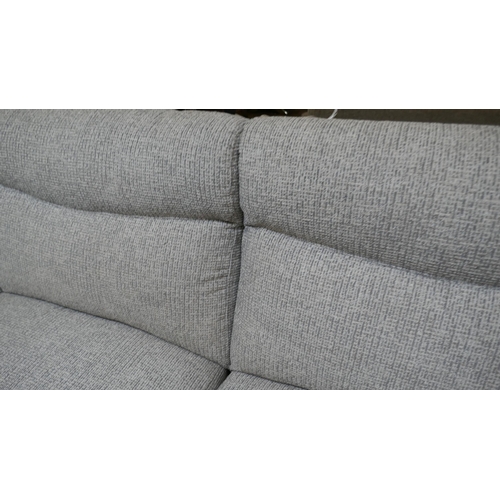 1494 - A grey weave reclining three seater sofa -slight wear