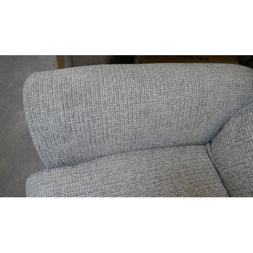 1494 - A grey weave reclining three seater sofa -slight wear