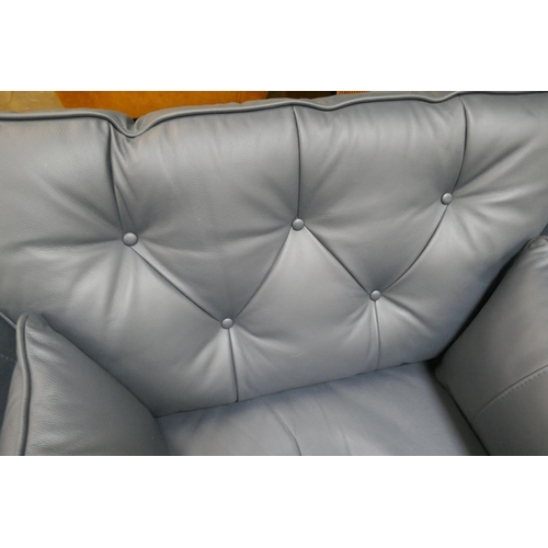 1497 - A blue leather Hoxton love seat RRP £1699