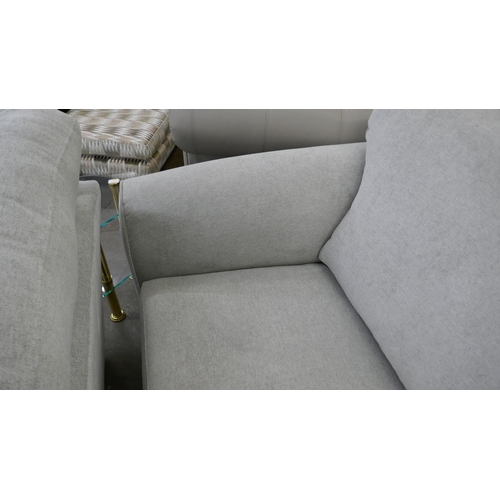 1502 - A grey upholstered three seater sofa and armchair