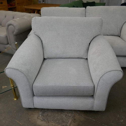 1502 - A grey upholstered three seater sofa and armchair