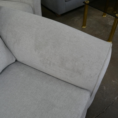 1502 - A grey upholstered three seater sofa and armchair