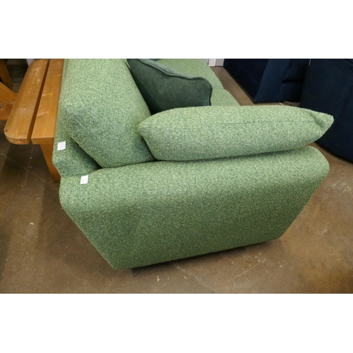 1505 - A vibrant green upholstered 2.5 seater sofa on a semi exposed frame RRP £1999