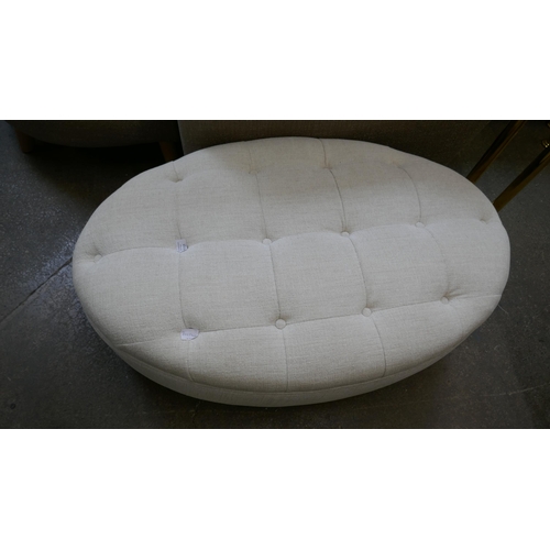 1512 - An oval ivory upholstered footstool